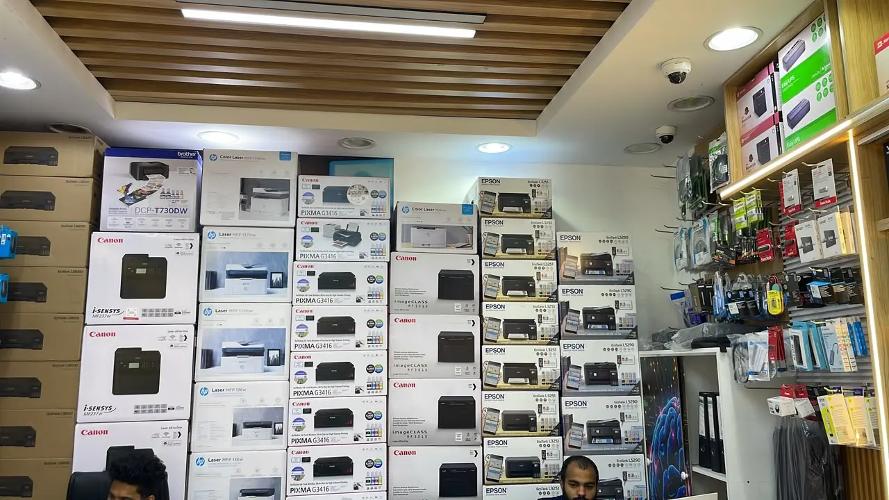 Shelves of printers and accessories inside the Colion International showroom