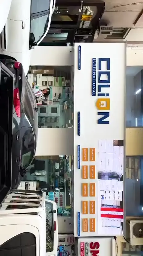 A walk through the Colion International showroom: laptops, tablets, printers, networking and accessories on the shelves.