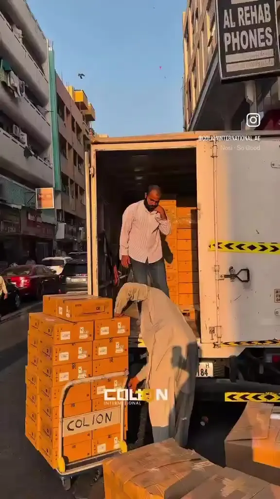 Epson printer cartons loaded onto a delivery truck