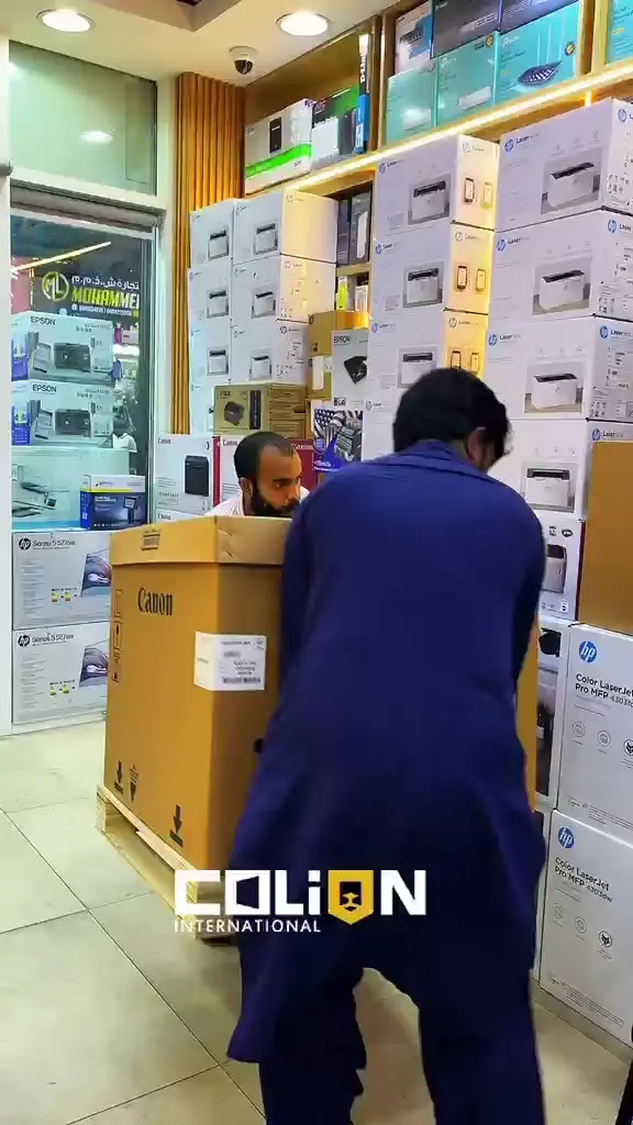 A pallet of Canon printers unloaded into the showroom